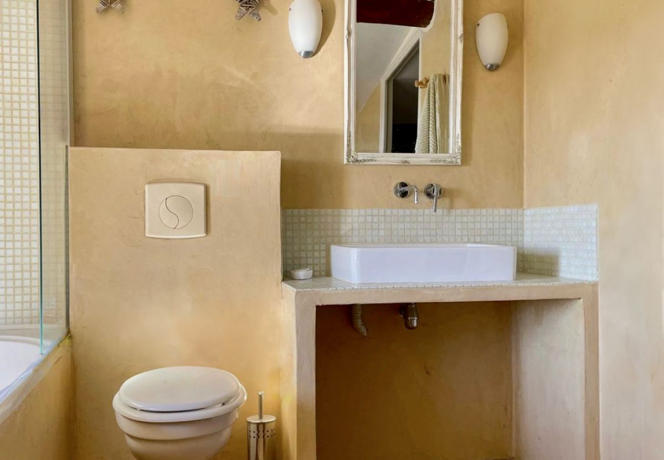 A simple, authentic bathroom in natural colours
